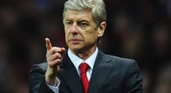 Wenger keen to remain a manager