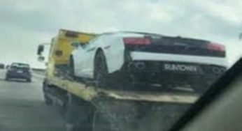 Runtown’s Management Reacts To Viral Photos Of His N150 Million Lamborghini Gallardo Getting Towed